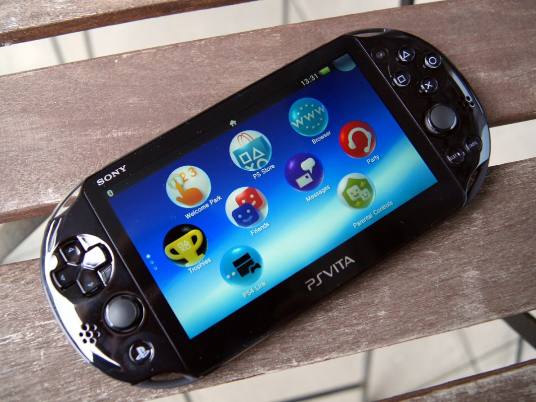 Sony PlayStation Vita Slim flat on a bench