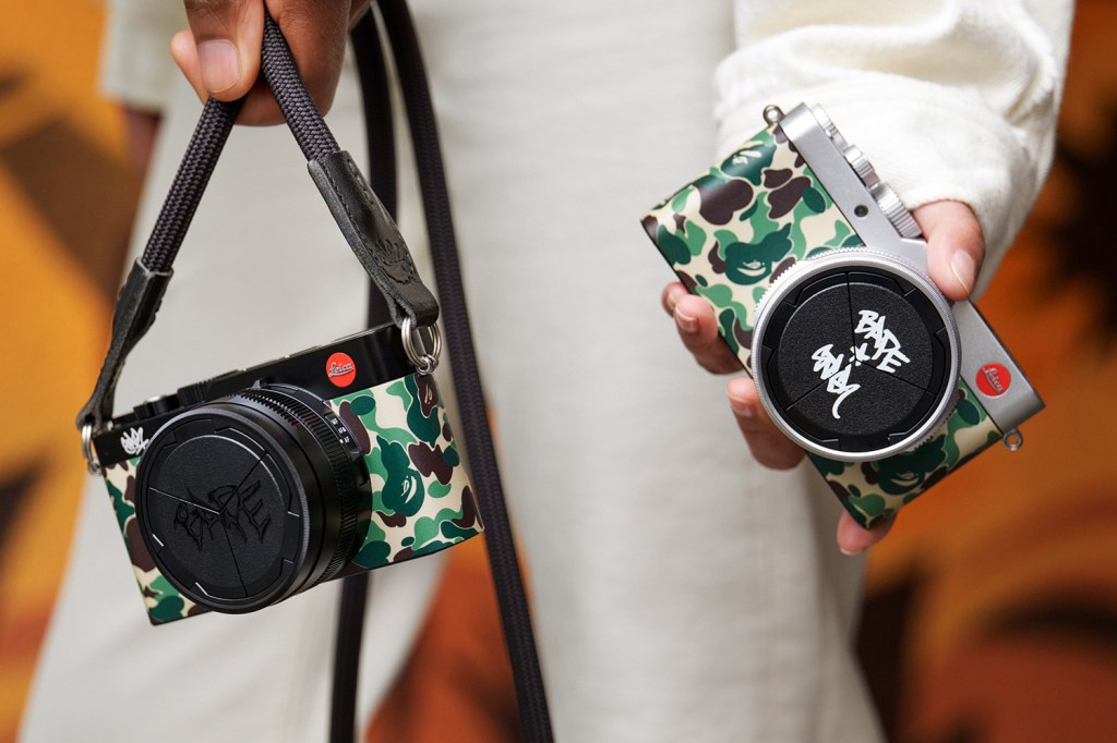 Leica x bathing ape x stash camera held in a hand