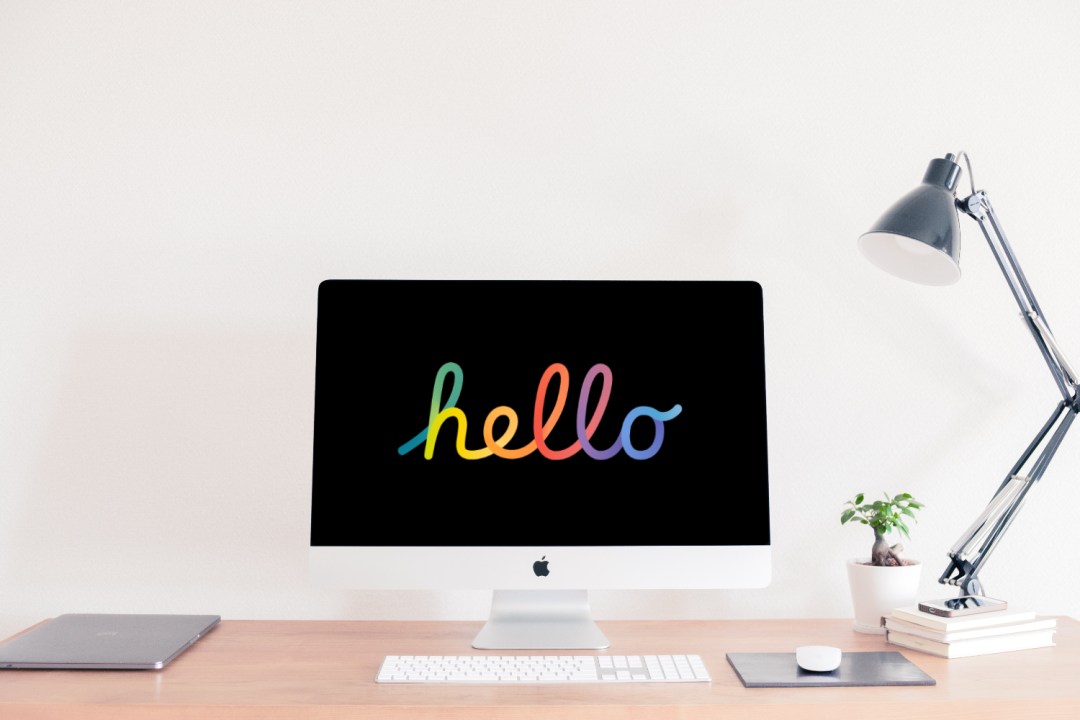 An old iMac with Apple's "Hello" written on it