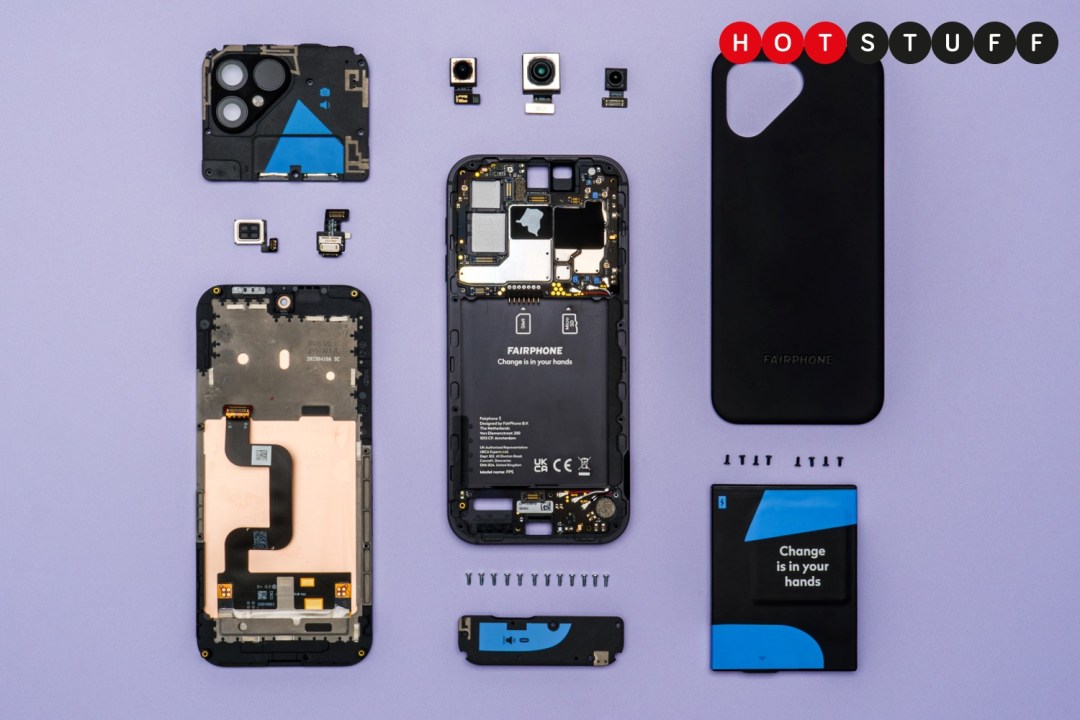 A dismantled Fairphone 5 on a purple background