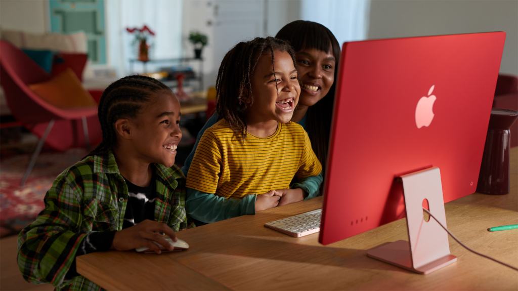 M3 iMac in red on desk